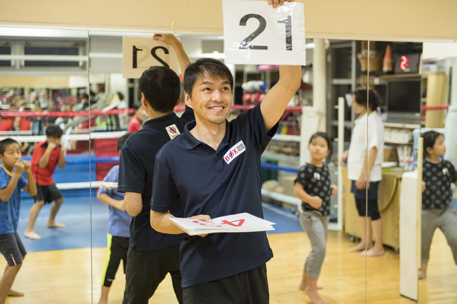 子どもたちを指導する飯田さん（写真は飯田さんより提供）
