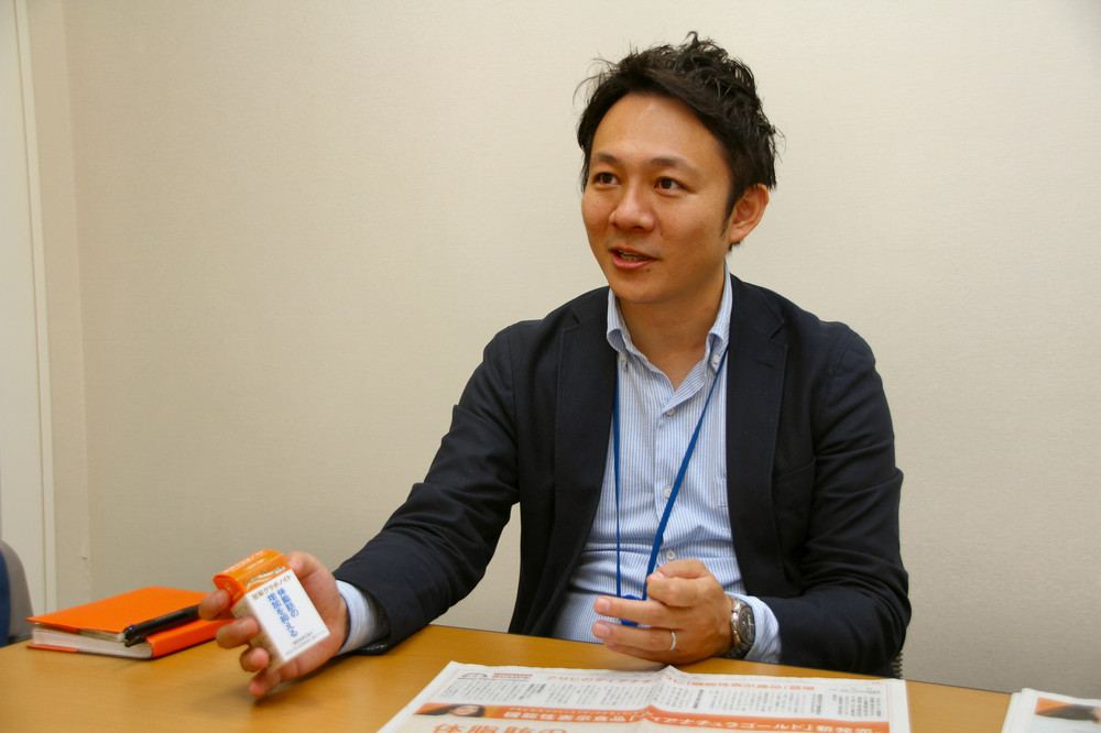 インタビューに答えるアサヒフードアンドヘルスケアの山本直樹さん