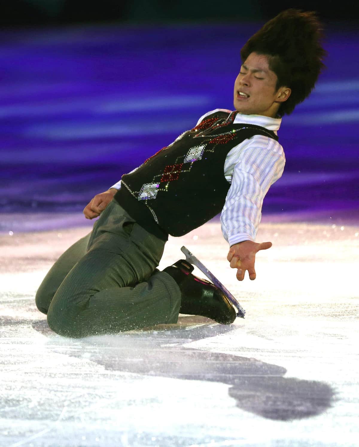 14年ソチ五輪エキシビジョンではクイーン「ドント・ストップ・ミー・ナウ」に載せエアギターを披露した町田さん（写真：アフロ）