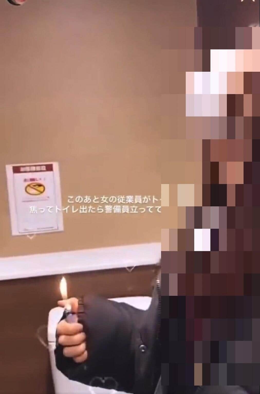 ライターに火を点ける女性（投稿された動画から）