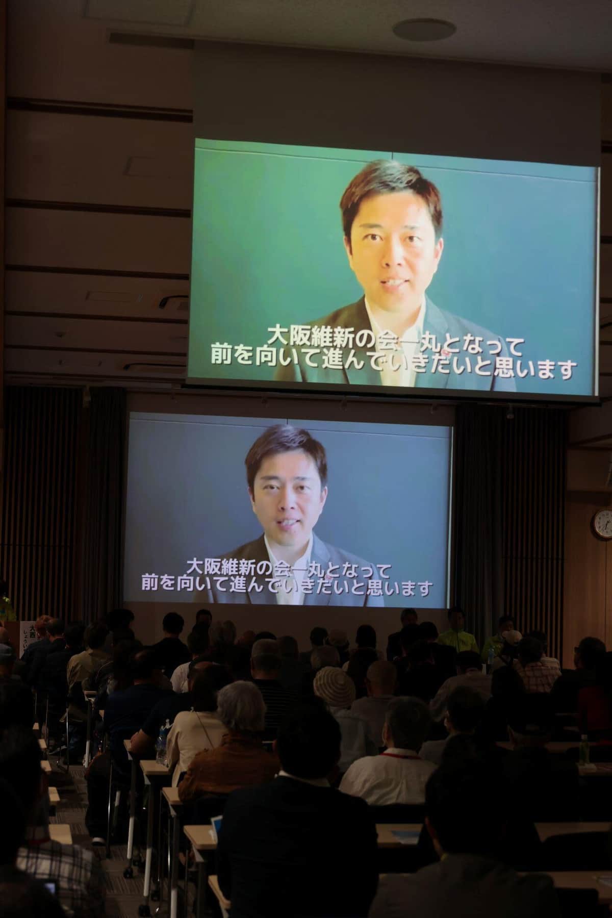 会場では冒頭、吉村洋文代表のビデオメッセージが流された（5月7日、大阪市都島区）
