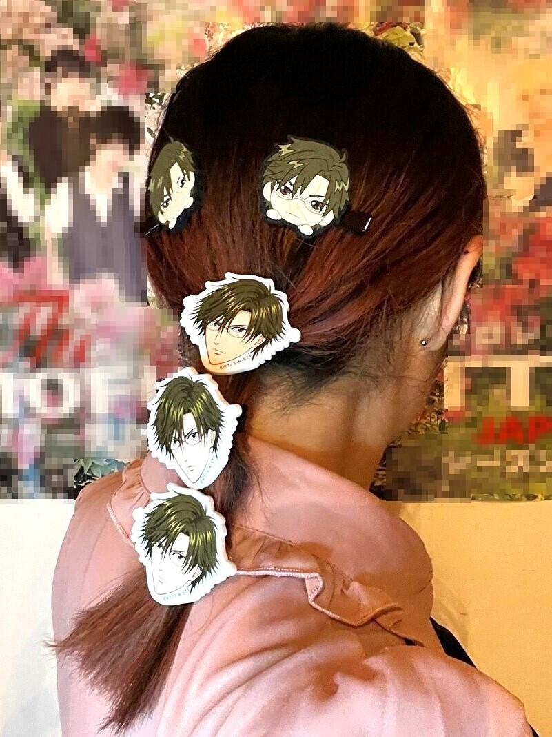 推し活のトレンド「生首ヘアゴム」 好きなキャラや芸能人の顔面を