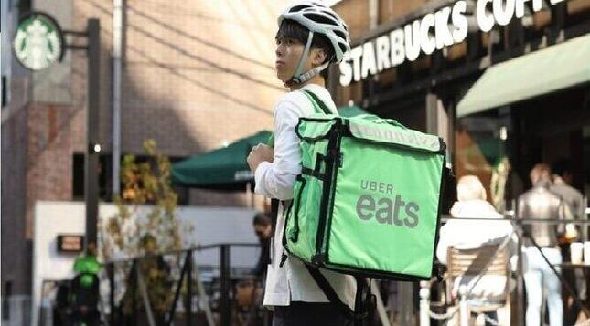 いまや街で見かけないことがないUber Eats（写真はウーバー・ジャパンのホームページから）