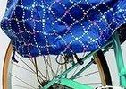 忙しい朝の一手間が省ける、自転車チャイルドシート用「レインカバー」