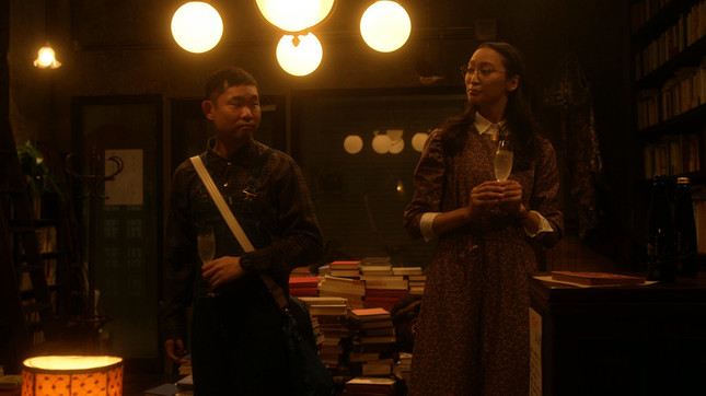 店主と「滝田」が乾杯