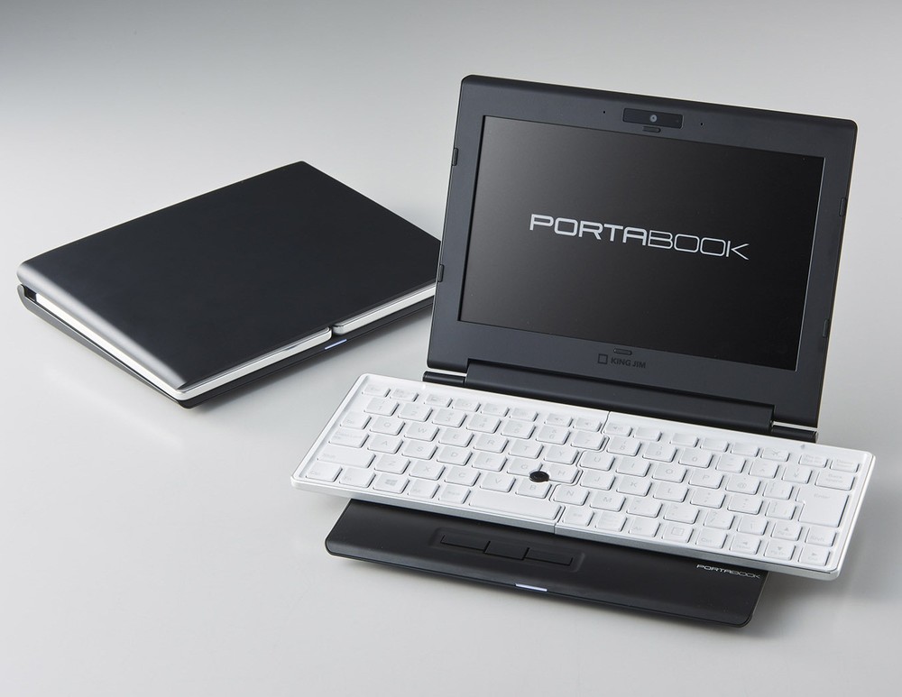 小さくたたんで大きく使えるモバイルPC　キングジム「ポータブックXMC10」　新発想の「スライドアーク キーボード」
