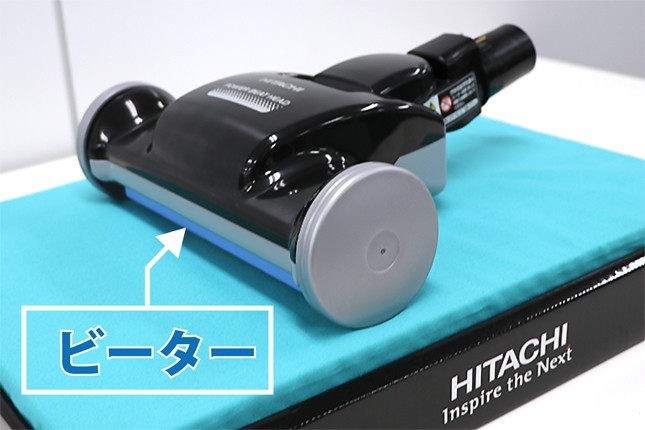 「電動ふとん吸口」は青いビーターが上下に振動し、ふとんを叩いてゴミを吸引する