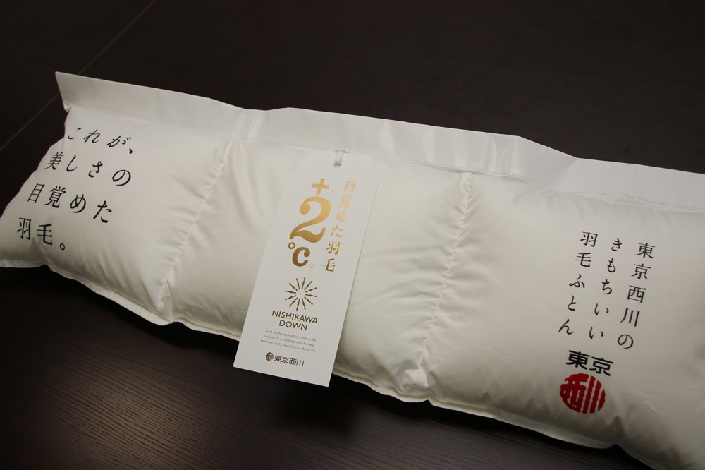 「羽毛ふとん」型中吊り広告